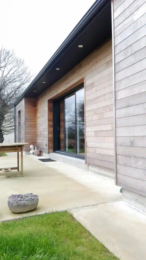 maison-terrasse-bois-avec-garage-maisons-passiva_01 Maison ossature bois